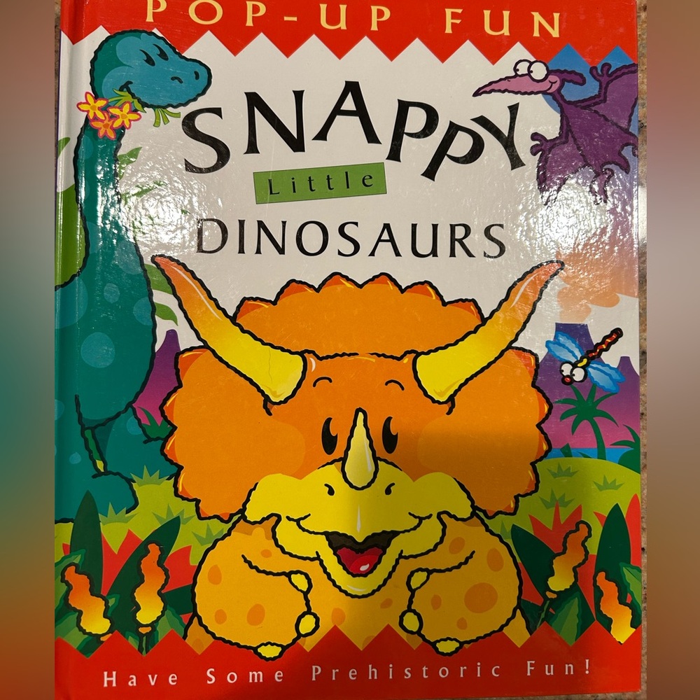 Snappy Little Dinosaurs Pop-Up Book 2001. Ages 4-6. Like new all pop ups pop up.